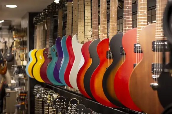 solored electric guitars showcase music store