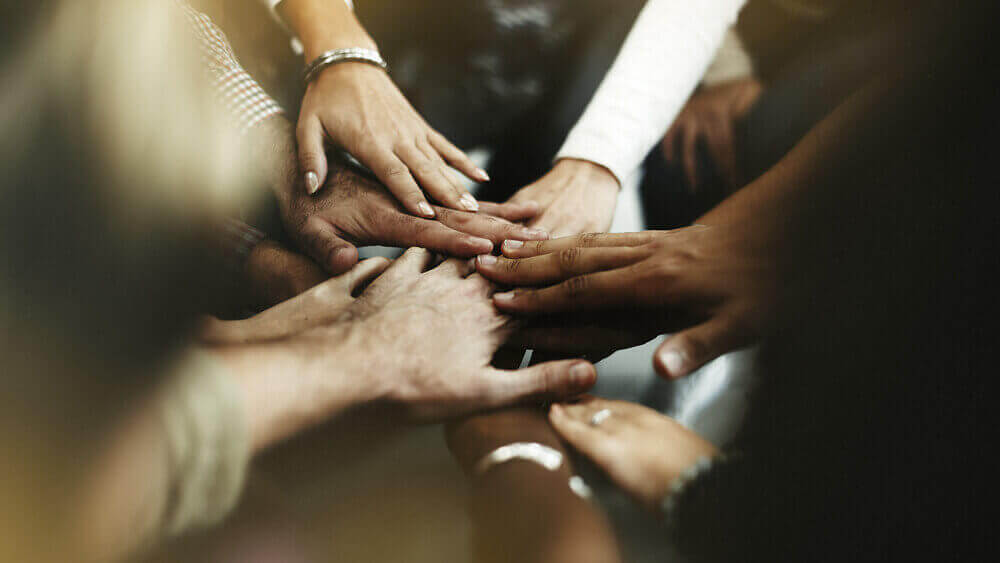 People joining their hands