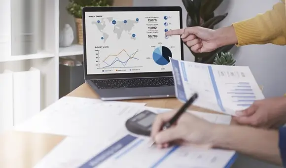 businesspeople meeting plan analysis graph