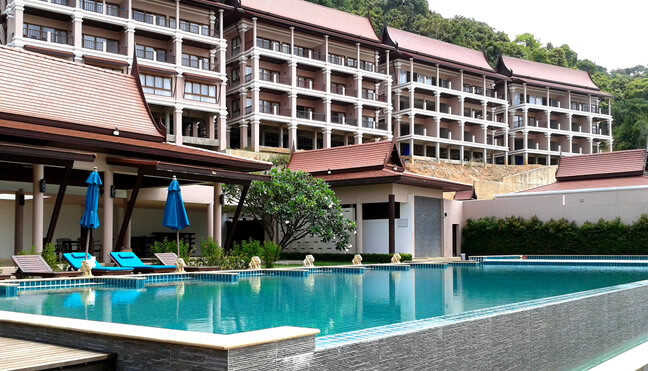 An empty swimming pool inside a hotel