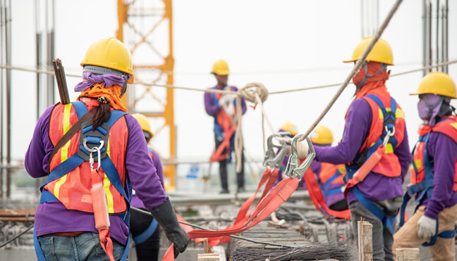 Factory workers working on site